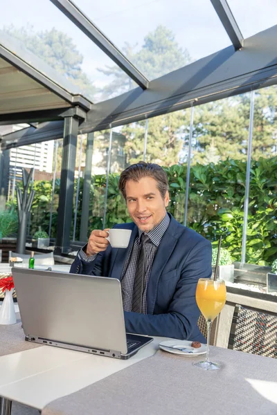 Handsome Man Using Notebook Restaurant While Drinking Coffee —  Fotos de Stock