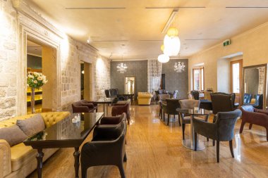 Interior of a hotel restaurant with marble floor