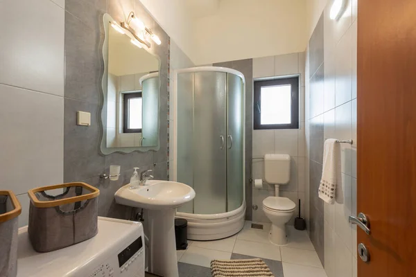 Bathroom interior with shower cabin