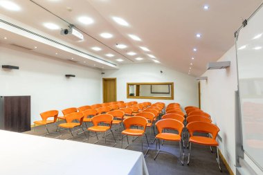 Interior of a room for presentations full of chairs