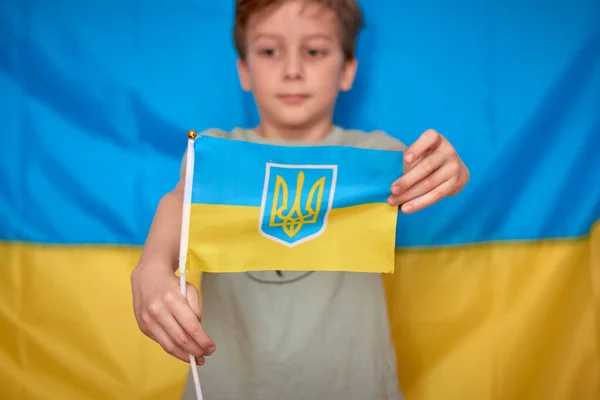 Boy Holding Hands Ukrainian Flag Yellow Blue Background Kids Support — Stock Photo, Image