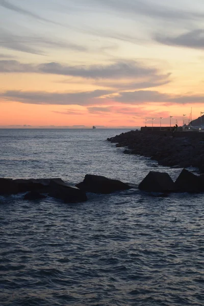a large sea coast at sunset, the beautiful view of the mediterranean beach on the shores of the black