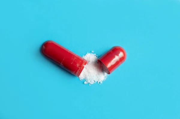 View Single Red Color Gel Capsule Opened White Powder Spilled — Stock Fotó