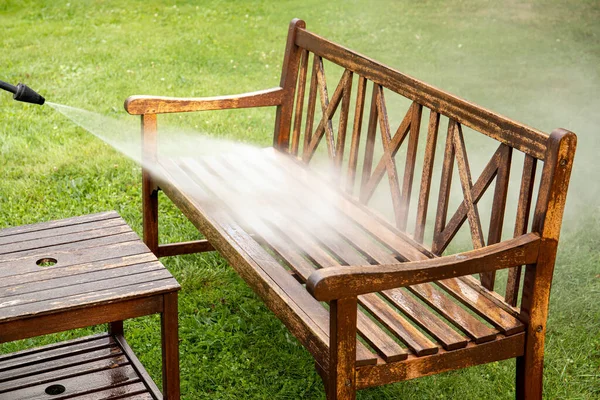 Close View Person Working Cleaning Pressure Washing Wooden Garden Furniture — Stockfoto