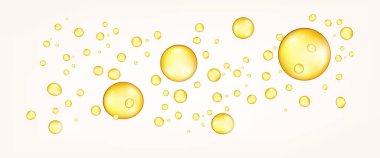 Organik sarı yağ damlacıkları. Balık yağı vitamin baloncukları damlası.