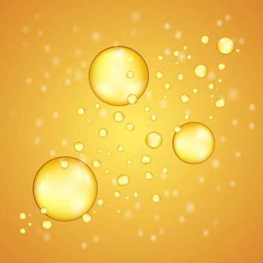Organik sarı yağ damlacıkları. Balık yağı vitamin baloncukları damlası.