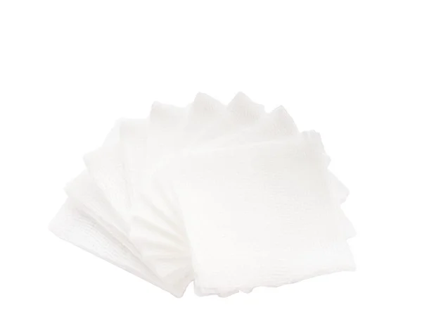 在孤立的白色背景上堆放一堆堆垫纱布 — 图库照片