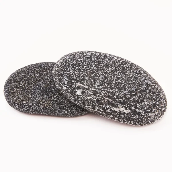 Black sea pebbles - set on white background — Stock Photo, Image