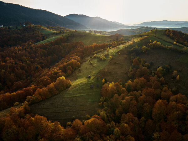 Deep Colorful Autumn Landscape At Sunrise Golden Hour. Epic Hill Chain Scenery Covered by Lush Woods. Ukraine Ecosystem Wildlife Habitat Natural Environment Concept Stock Image