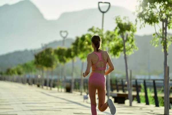 Young Fitness Sports Woman Running Outdoors Promenade Sunset — kuvapankkivalokuva