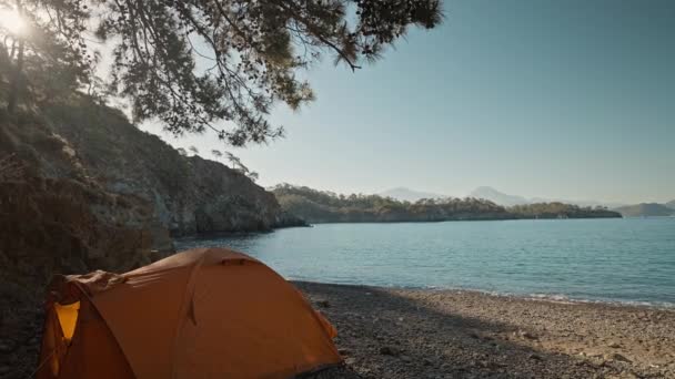 Orange Tent Wild Empty Pebble Beach Morning Coast Mediterranean Sea — стоковое видео