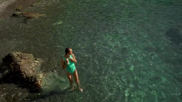 Stunning Slim Fit Body Woman Green Swimsuit Sunbathing Relaxing Clear — Vídeo de stock