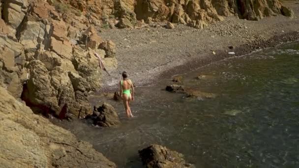 Rear View Beautiful Slim Fit Body Woman Green Swimsuit Sunbathing — Stockvideo