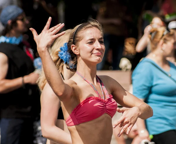 Young and sexy student in a swimwear dance zumba class — Stock Photo, Image