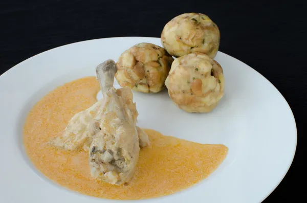 Chicken with dumplings and paprika sauce — Stock Photo, Image