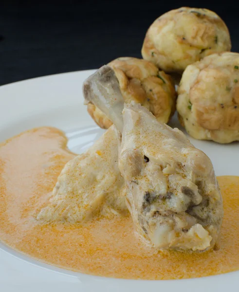 Chicken with dumplings and paprika sauce — Stock Photo, Image
