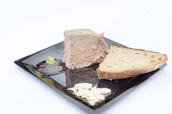Duck pate with sauce of black berries and cranberries — Stock Photo, Image