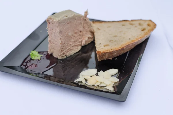 Duck pate with sauce of black berries and cranberries — Stock Photo, Image