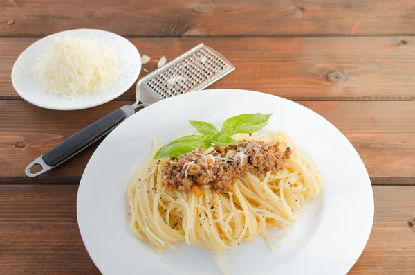 Spaghetti Bolognese on wood table — Stock Photo, Image