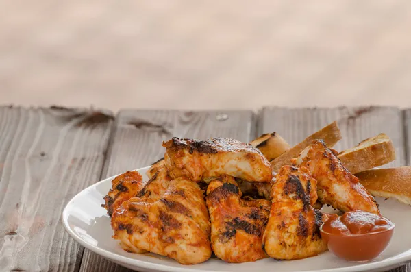 Chicken wings on grill — Stock Photo, Image