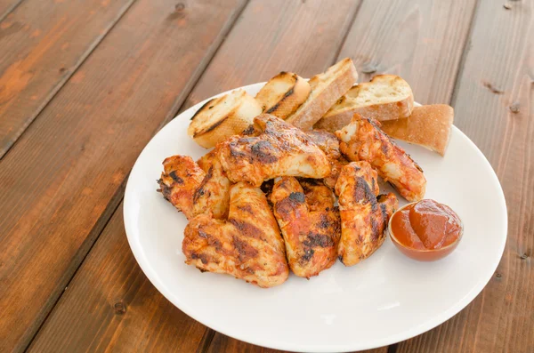 Chicken wings on grill — Stock Photo, Image