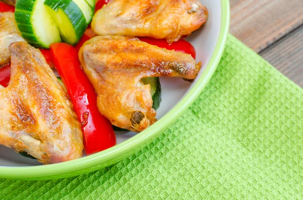 Chicken wings baked with vegetable — Stock Photo, Image