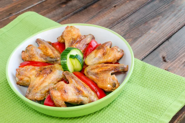 Chicken wings baked with vegetable — Stock Photo, Image