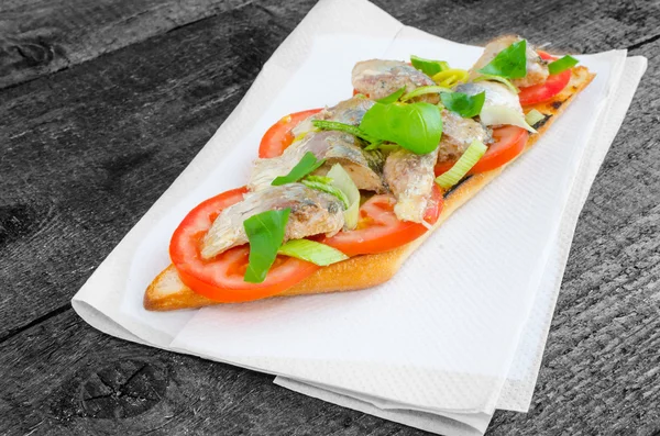 Bruschetta with tomato, sardines — Stock Photo, Image