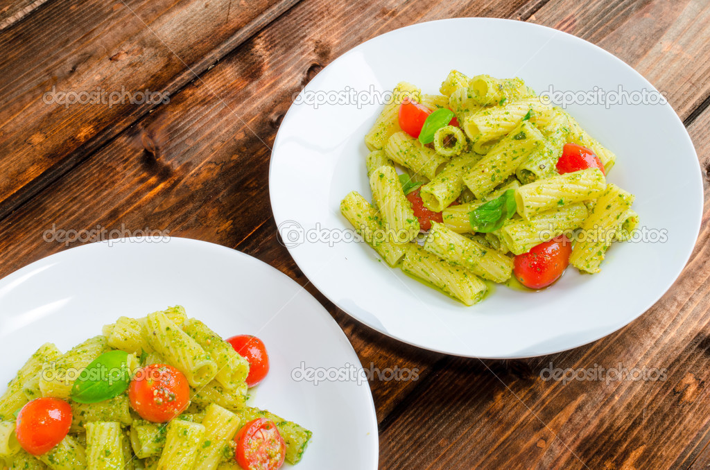 Rigatoni pasta with genoese pesto and sherry tomato