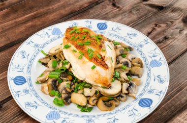 chicken breast with mushrooms and spring onions clipart