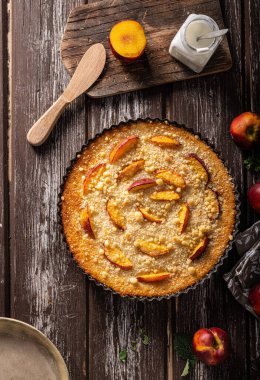 Nectarine tart with sugar and fresh mint