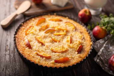 Nectarine tart with sugar and fresh mint
