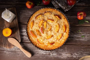 Nectarine tart with sugar and fresh mint