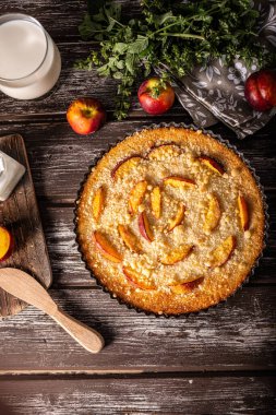 Nectarine tart with sugar and fresh mint