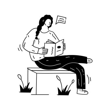 Genç bir kadın yerde oturup kitap okuyor.