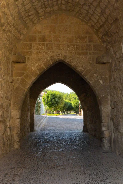 ancient stone arch of the royal monastery of Las Huelgas in Burgos Spain.