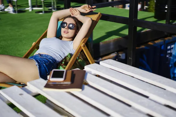 Portrait Charming Hipster Girl Trendy Sunglasses Looking Camera While Lying — Stok Foto