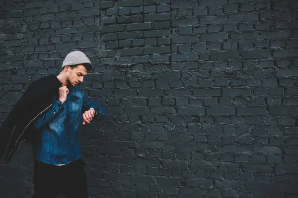 Thoughtful Young Hipster Denim Shirt Hat Black Jacket Shoulder Walking — Stock Photo, Image