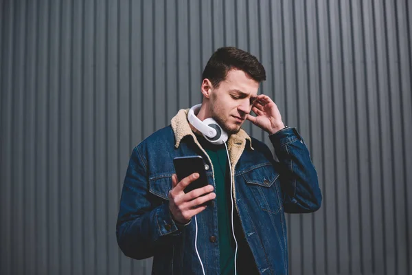 Confident Guy Jean Jacket Headphones Listening Music Smartphone Closed Eyes — Stock Photo, Image