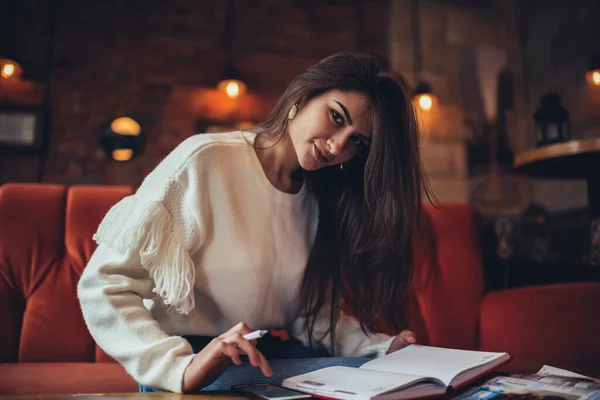 Smiling Woman Student Long Hair Inclining Head Looking Camera While — Stock Photo, Image