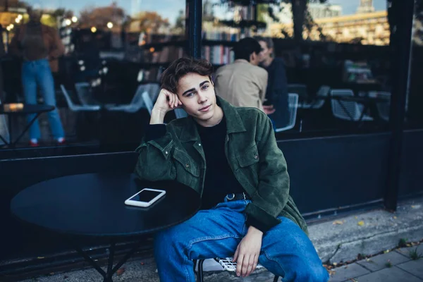 Young Smiling Male Student Casual Outfit Looking Camera While Sitting — Stock Photo, Image