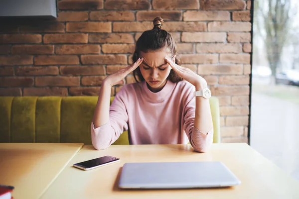 Tired Woman Casual Clothes Sitting Table Hands Forehead Closed Eyes — Stock Photo, Image