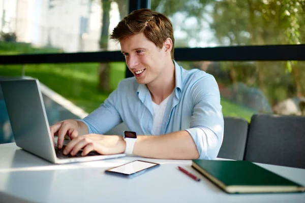 Cheerful Male Programmer Updating Software Settings Netbook Technology Using Internet — Stock Photo, Image