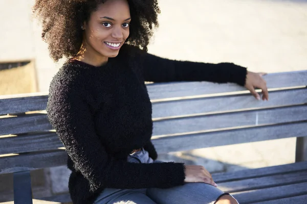 Optimistic Young African American Female Wearing Warm Sweater Jeans Looking — Stock Photo, Image