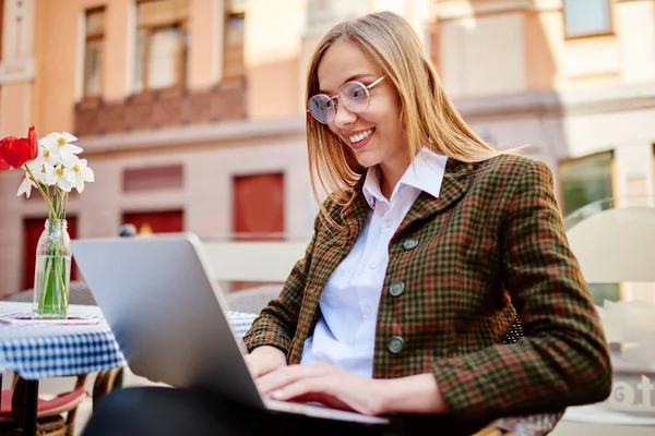 Young Optimistic Female Remote Worker Eyewear Toothy Smile Surfing Internet — Stock Photo, Image