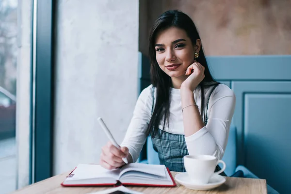 Positive Female Student Long Dark Hair Stylish Outfit Taking Notes — Stock Photo, Image