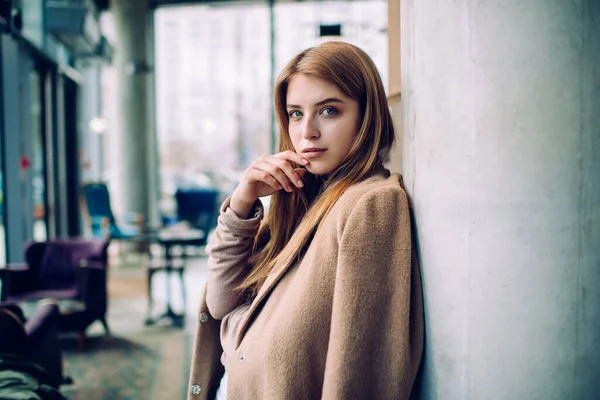 Side View Pensive Female Long Hair Coat Shoulders Standing Corridor — Stock Photo, Image