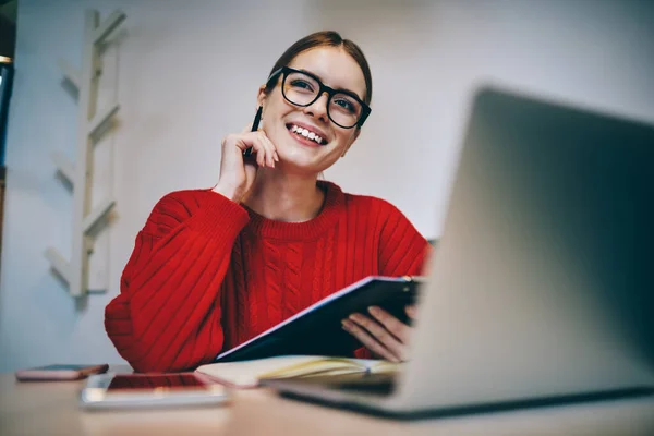 Low Angle Cheerful Woman Spectacles Red Jumper Notepad Hand Looking — Stock Photo, Image