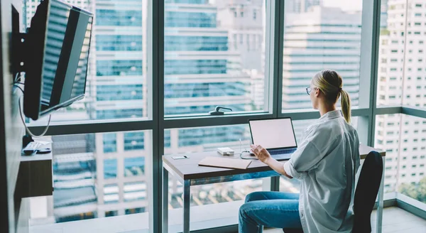 Back View Woman Casual Clothes Sitting Table Browsing Laptop While — Stock Photo, Image