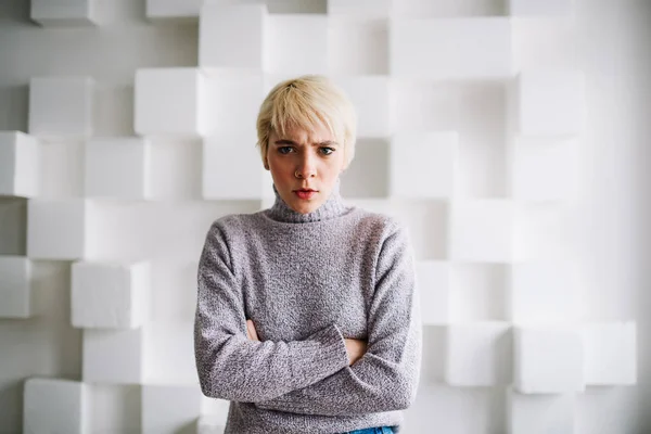 Young Displeased Female Folded Hands Looking Camera Spending Free Time — Stock Photo, Image